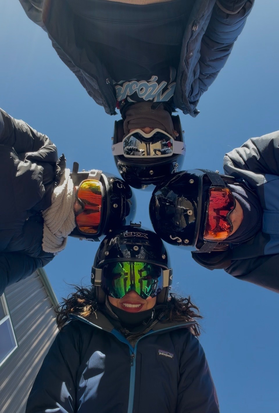 Fun group photo from below during a ski trip
