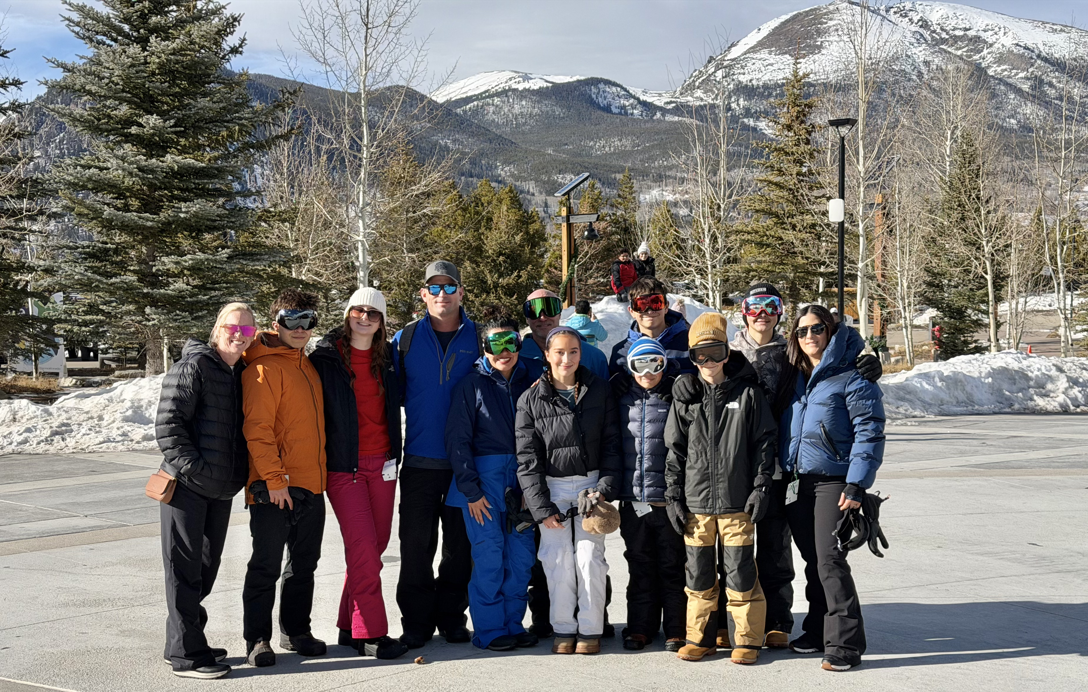 Large group gathered outdoors on a winter trip