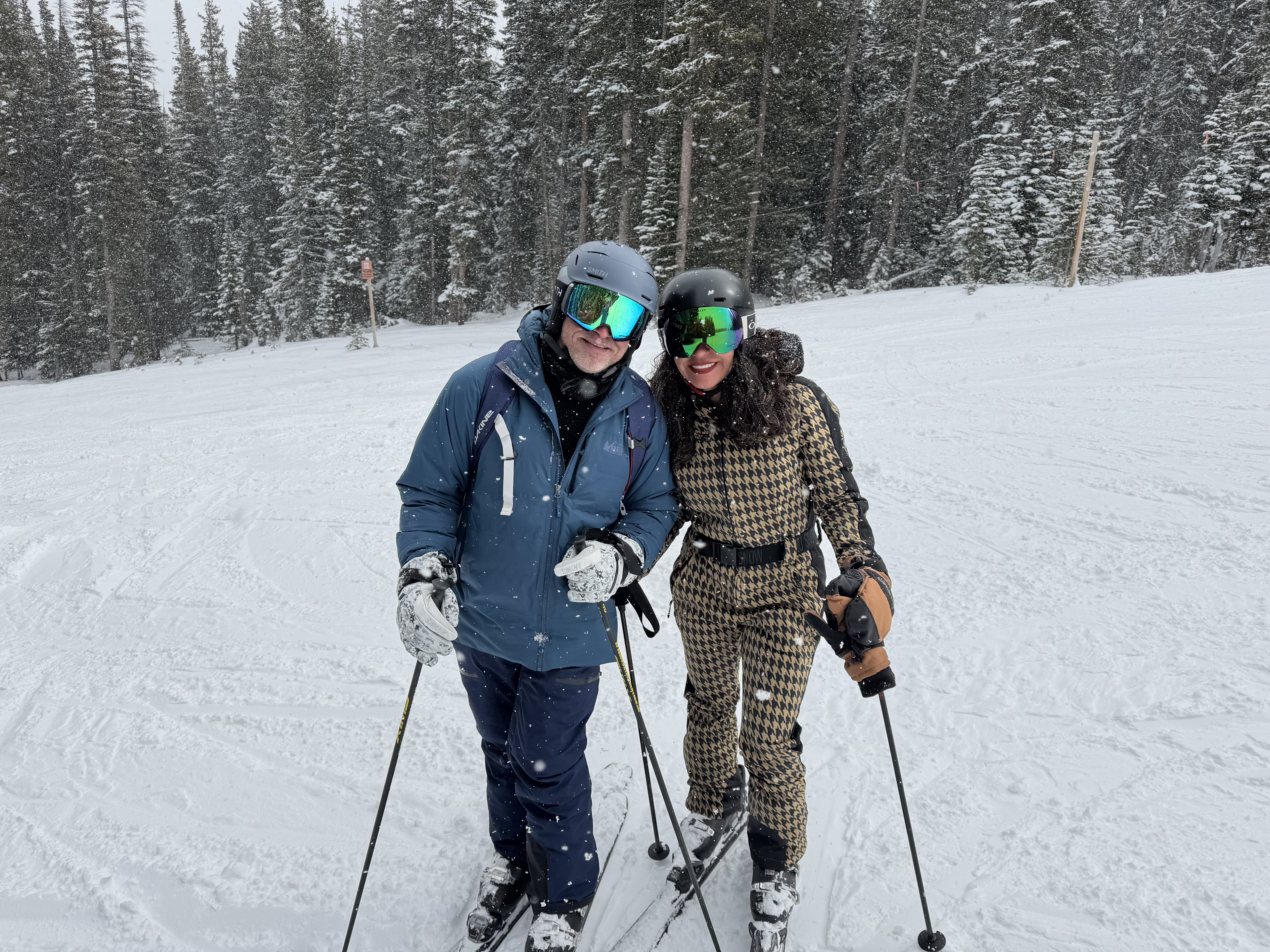 Guests skiing together on a snowy Park City mountain